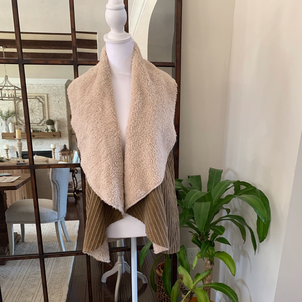 Super soft Sherpa and corduroy vest with shawl collar.